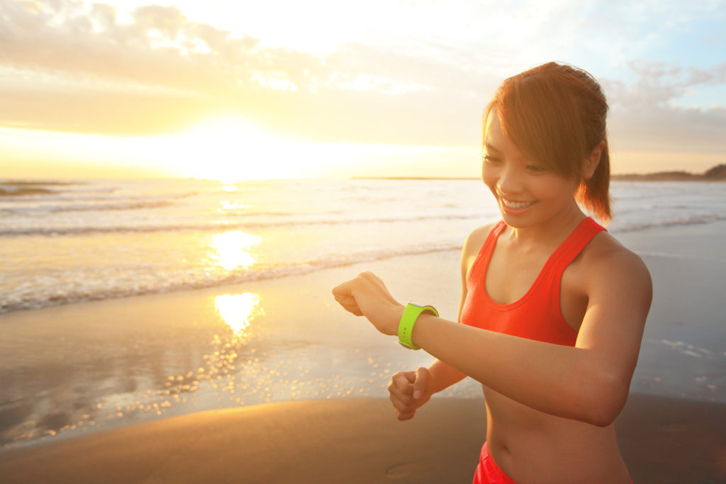 Woman with wearable device